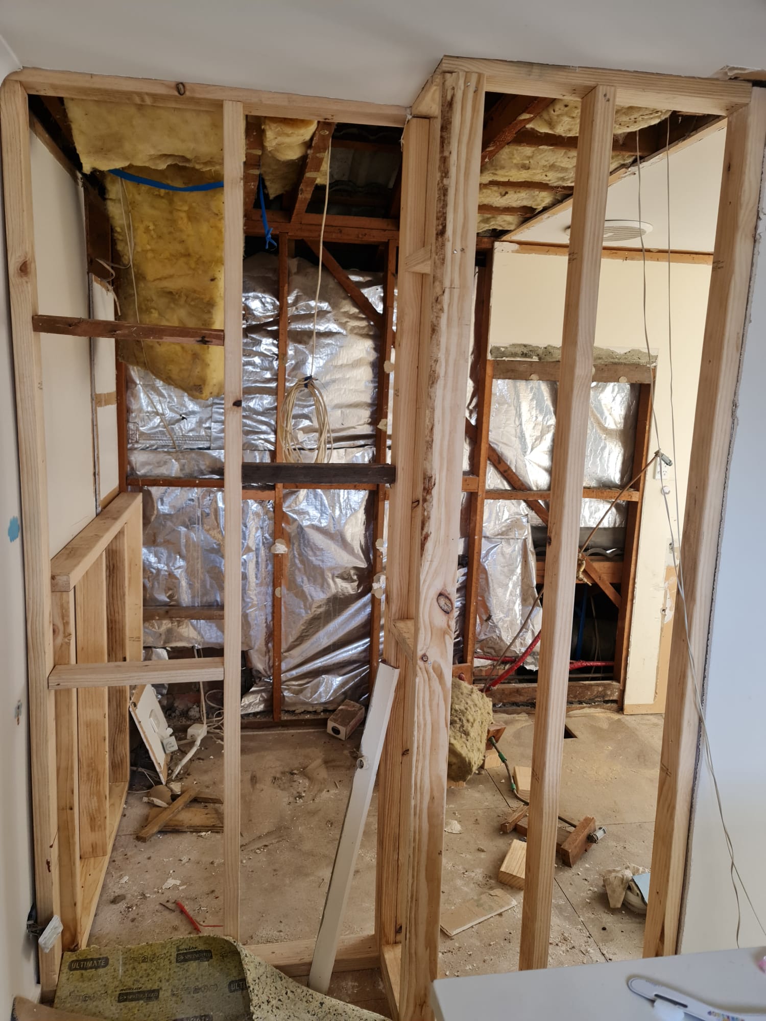 Bathroom framing and foil sarking exposed with ceiling open