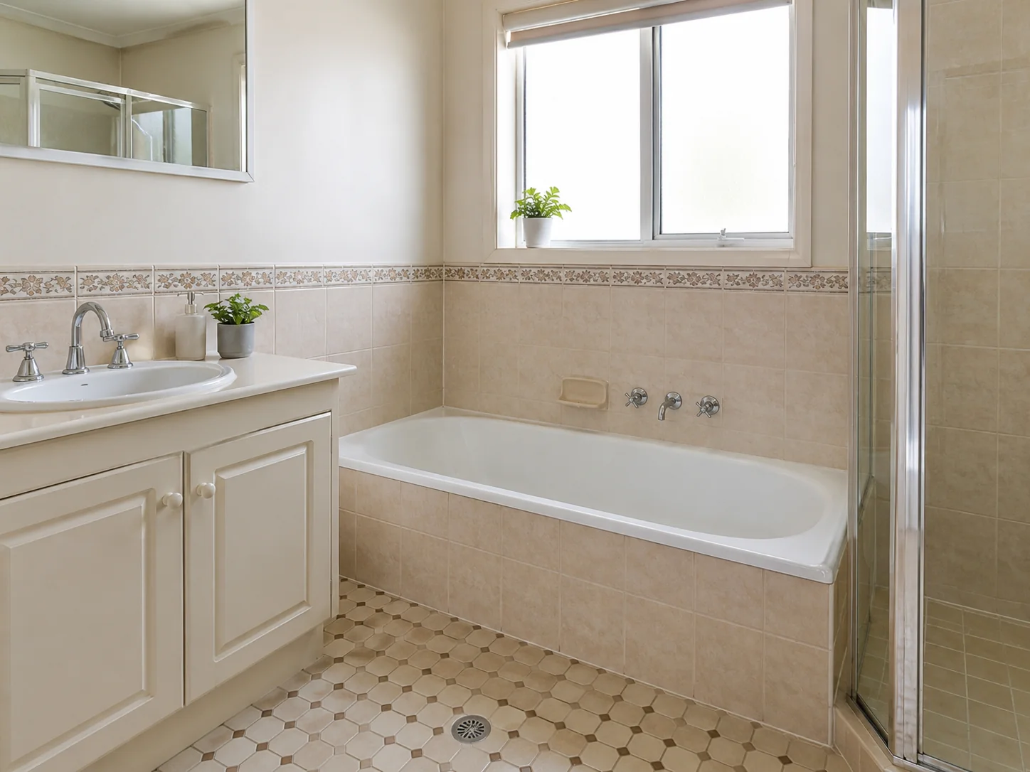 Re-glazed bathtub and repainted vanity showing the limits of a cosmetic bathroom refresh