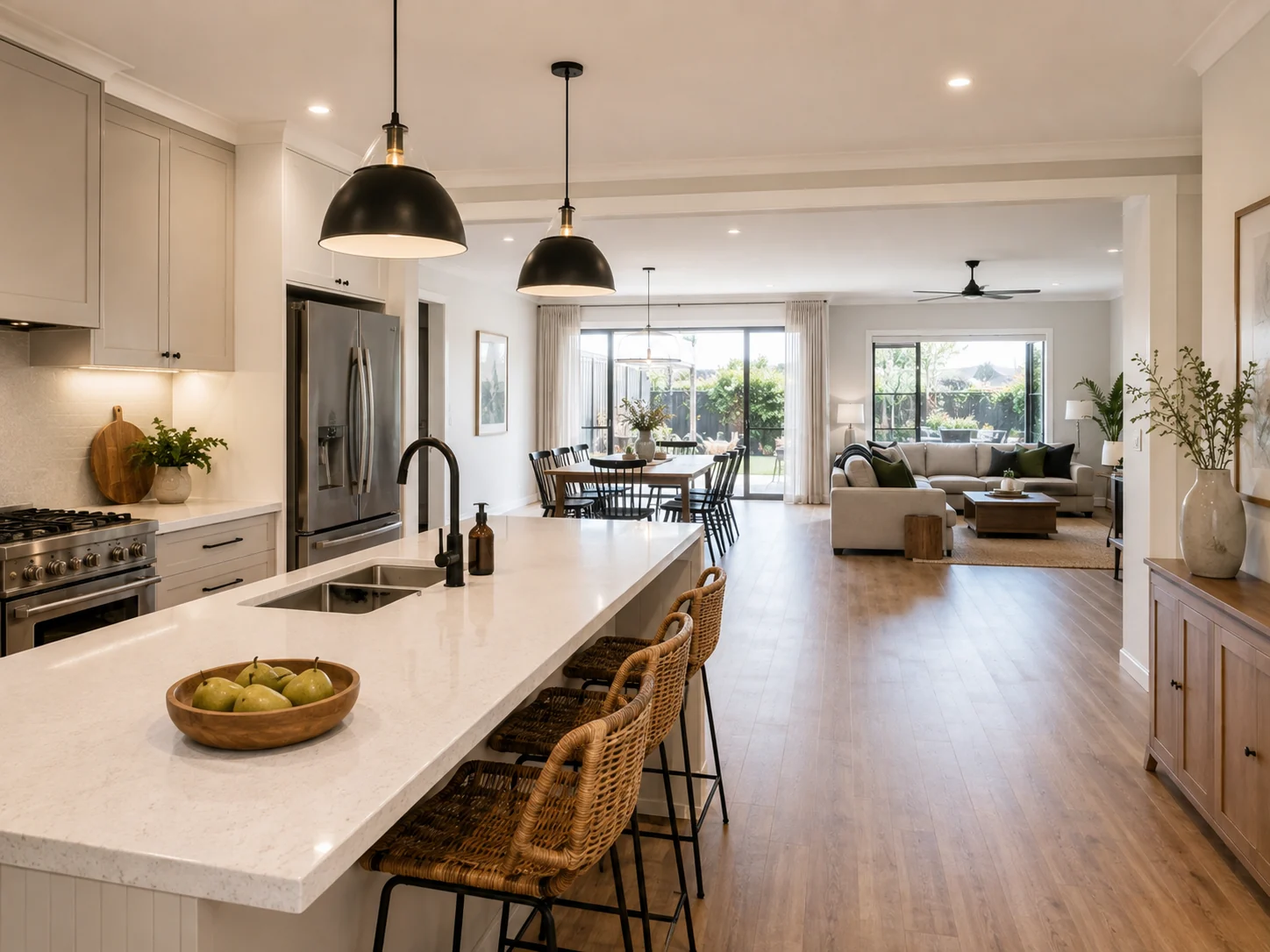 Open-plan kitchen connected directly to dining and living areas after a non-structural wall was removed