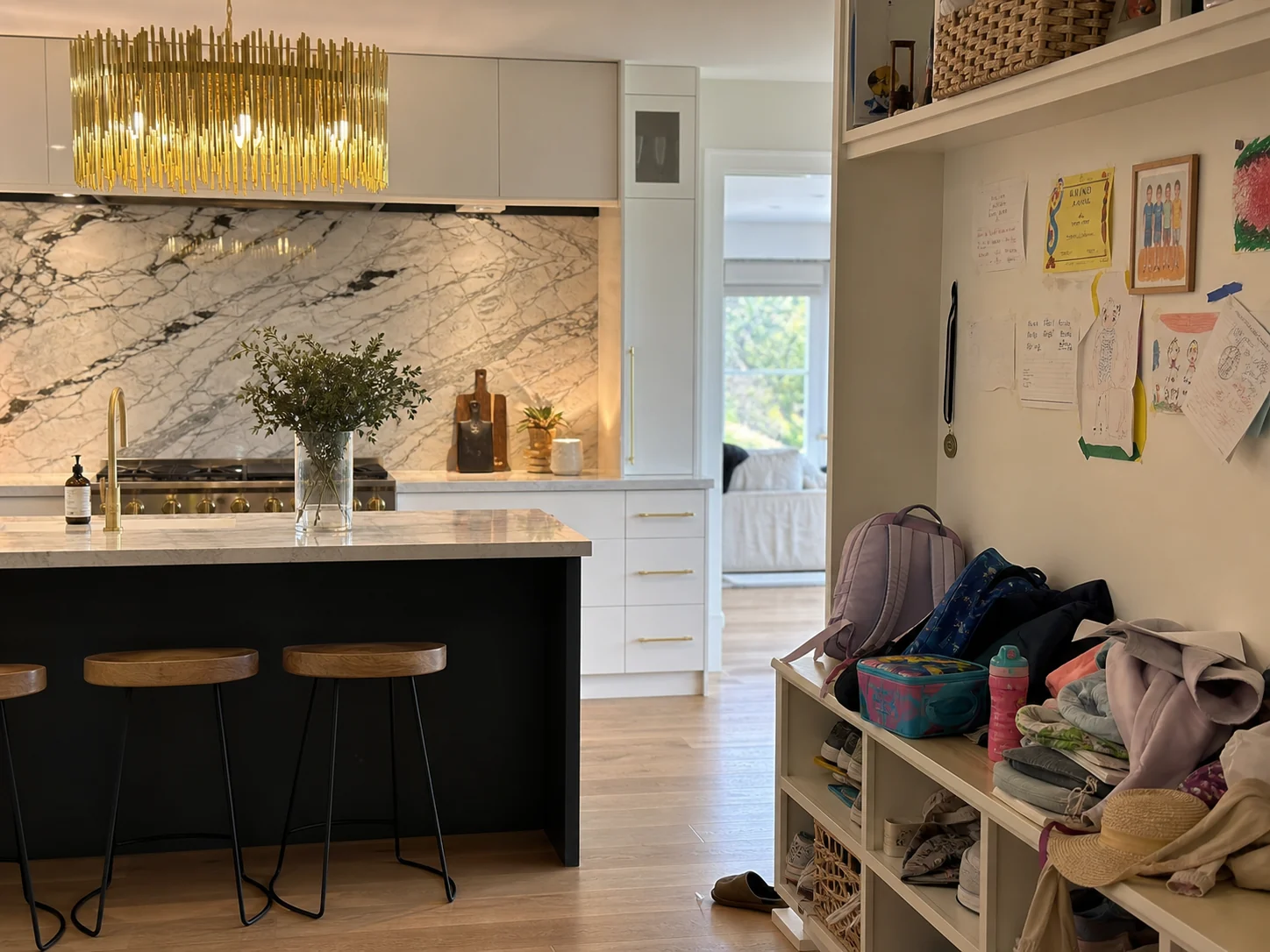 A striking feature splashback contrasted with cramped, insufficient kitchen storage in a family home renovation