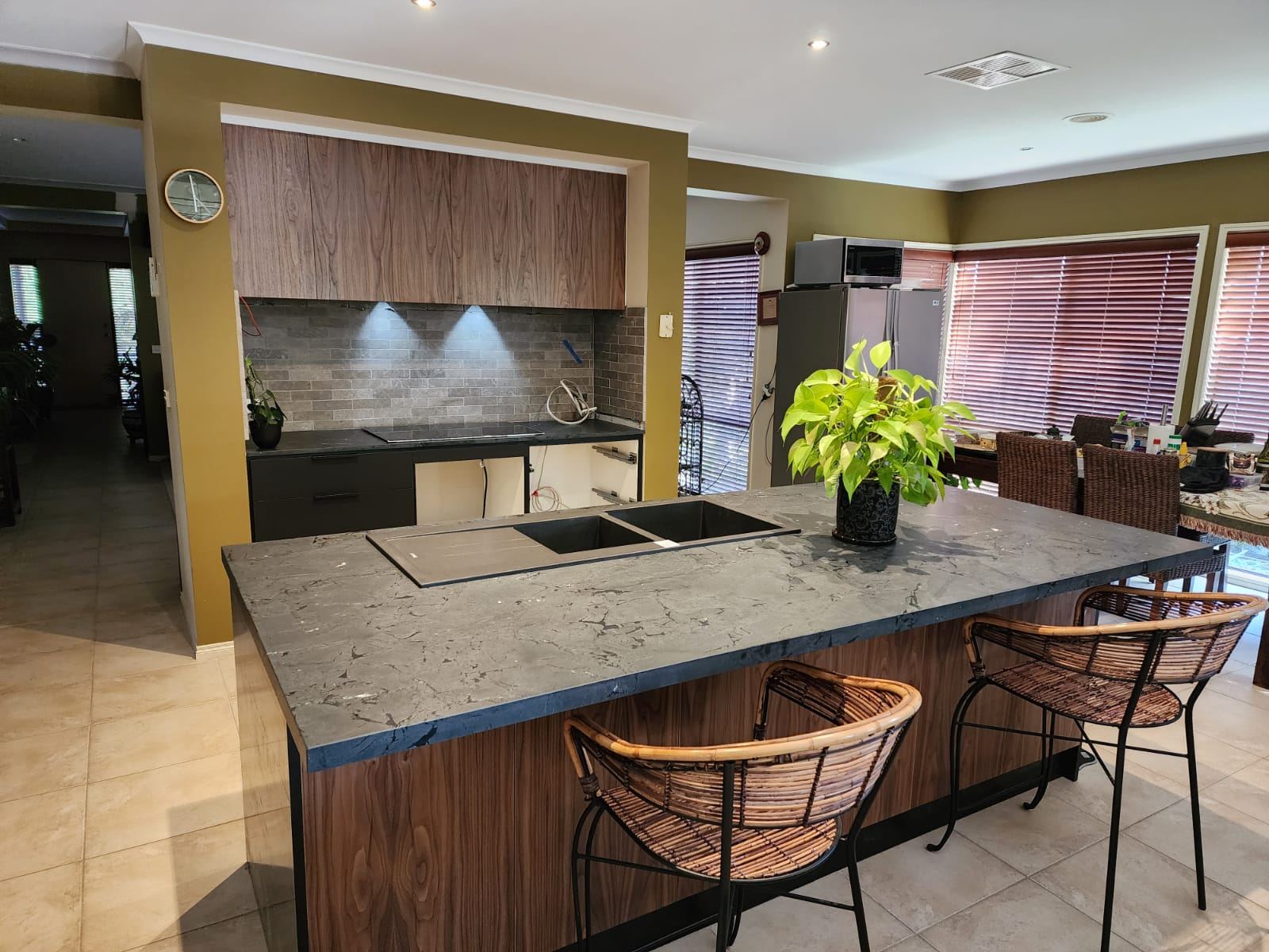 Kitchen island with bar seating, finished